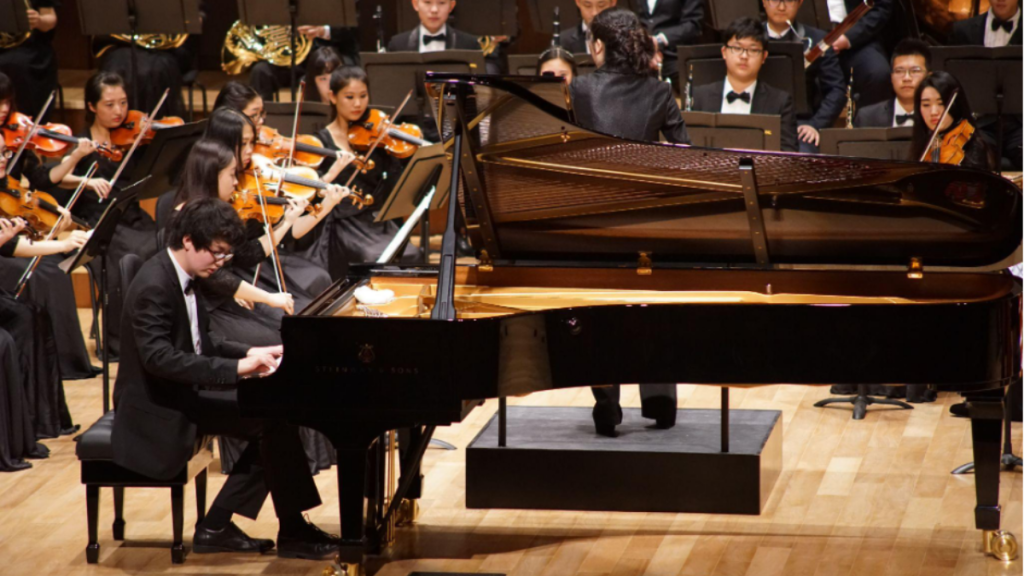 Pianist Xiaohe Liu’s Journey through Captivating Performances and International Collaborations